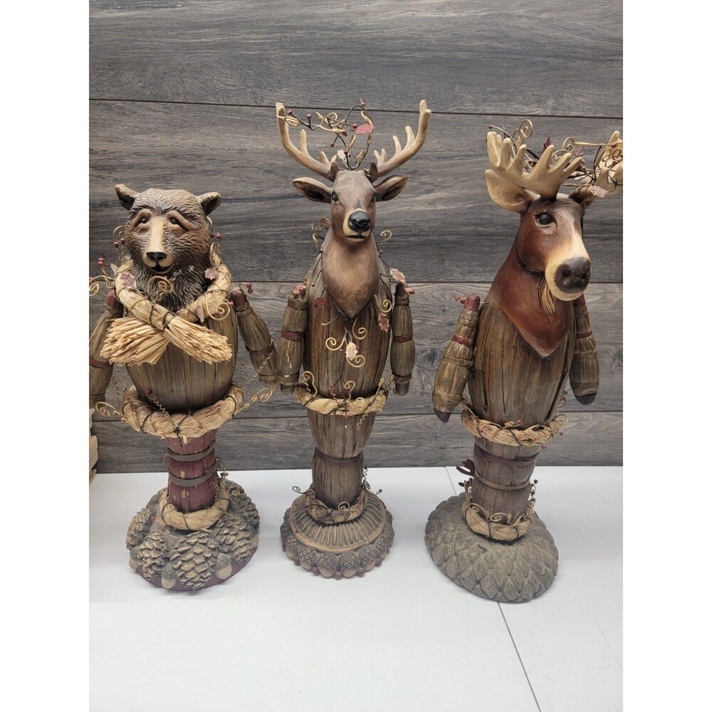 three-piece Department 56 folk art figurine set